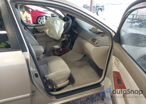 2004 Toyota Corolla Le from USA, damaged, VIN 1NXBR32E24Z292303